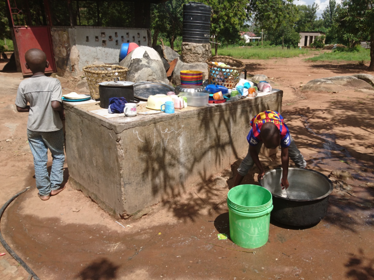 Everyone has their tasks within Upendo Daima. Doing the dishes for 50 children is quite a task!